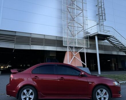 Красный Мицубиси Лансер, объемом двигателя 2 л и пробегом 307 тыс. км за 6499 $, фото 3 на Automoto.ua