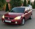 Червоний Міцубісі Lancer, об'ємом двигуна 1.6 л та пробігом 200 тис. км за 4500 $, фото 1 на Automoto.ua