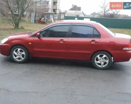 Красный Мицубиси Лансер, объемом двигателя 1.6 л и пробегом 250 тыс. км за 3700 $, фото 6 на Automoto.ua