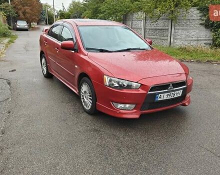 Червоний Міцубісі Lancer, об'ємом двигуна 2 л та пробігом 186 тис. км за 5600 $, фото 7 на Automoto.ua