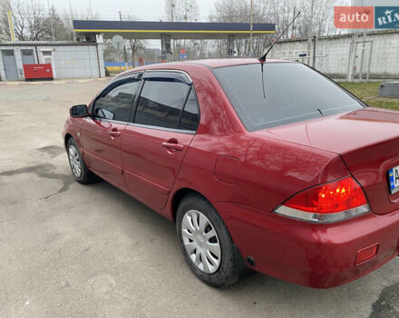Червоний Міцубісі Lancer, об'ємом двигуна 1.58 л та пробігом 151 тис. км за 5600 $, фото 4 на Automoto.ua
