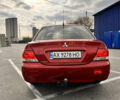 Червоний Міцубісі Lancer, об'ємом двигуна 1.6 л та пробігом 194 тис. км за 5500 $, фото 3 на Automoto.ua