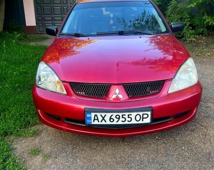 Червоний Міцубісі Lancer, об'ємом двигуна 1.6 л та пробігом 185 тис. км за 3900 $, фото 5 на Automoto.ua
