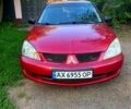Червоний Міцубісі Lancer, об'ємом двигуна 1.6 л та пробігом 185 тис. км за 3900 $, фото 5 на Automoto.ua