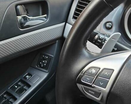 Міцубісі Lancer 2007 у Києві на Automoto.ua Червоний Міцубісі Lancer, об'ємом двигуна 2 л та пробігом 186 тис. км за 5600 $, фото 19 на Automoto.ua