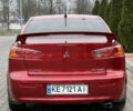 Красный Мицубиси Лансер, объемом двигателя 2 л и пробегом 261 тыс. км за 7200 $, фото 6 на Automoto.ua