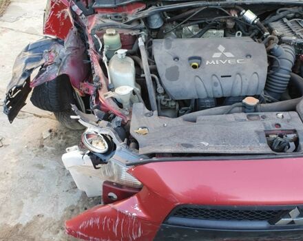 Красный Мицубиси Лансер, объемом двигателя 2 л и пробегом 406 тыс. км за 2750 $, фото 11 на Automoto.ua