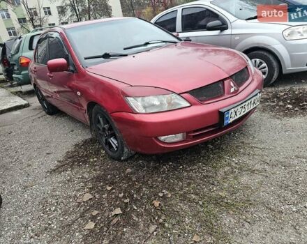 Червоний Міцубісі Lancer, об'ємом двигуна 1.6 л та пробігом 267 тис. км за 2999 $, фото 1 на Automoto.ua