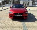 Красный Мицубиси Лансер, объемом двигателя 1.5 л и пробегом 168 тыс. км за 6200 $, фото 1 на Automoto.ua
