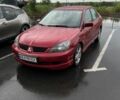 Червоний Міцубісі Lancer, об'ємом двигуна 2 л та пробігом 216 тис. км за 4000 $, фото 1 на Automoto.ua