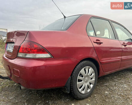 Красный Мицубиси Лансер, объемом двигателя 1.58 л и пробегом 280 тыс. км за 3250 $, фото 7 на Automoto.ua