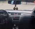 Красный Мицубиси Лансер, объемом двигателя 1.6 л и пробегом 198 тыс. км за 3500 $, фото 4 на Automoto.ua