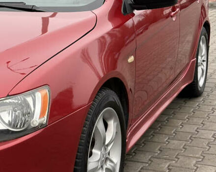 Красный Мицубиси Лансер, объемом двигателя 2 л и пробегом 261 тыс. км за 7200 $, фото 2 на Automoto.ua