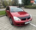 Красный Мицубиси Лансер, объемом двигателя 0 л и пробегом 282 тыс. км за 5200 $, фото 4 на Automoto.ua