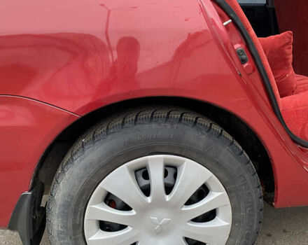 Червоний Міцубісі Lancer, об'ємом двигуна 1.58 л та пробігом 151 тис. км за 5600 $, фото 21 на Automoto.ua