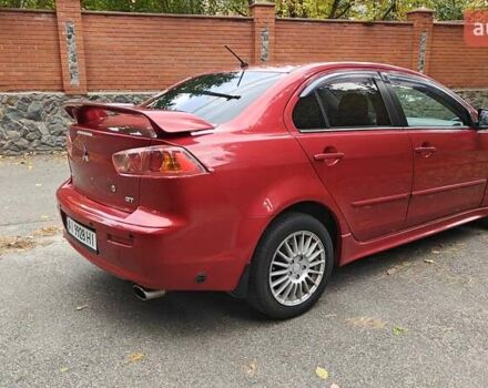 Міцубісі Lancer 2007 у Києві на Automoto.ua Червоний Міцубісі Lancer, об'ємом двигуна 2 л та пробігом 186 тис. км за 5600 $, фото 9 на Automoto.ua