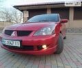 Червоний Міцубісі Lancer, об'ємом двигуна 2 л та пробігом 265 тис. км за 4300 $, фото 3 на Automoto.ua