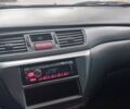 Красный Мицубиси Лансер, объемом двигателя 1.6 л и пробегом 198 тыс. км за 3500 $, фото 10 на Automoto.ua