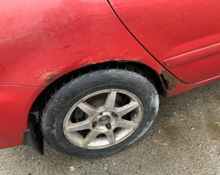 Червоний Міцубісі Lancer, об'ємом двигуна 1.6 л та пробігом 300 тис. км за 2799 $, фото 8 на Automoto.ua