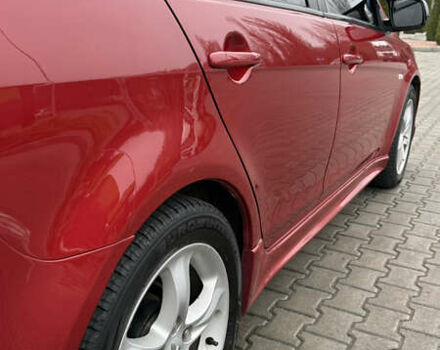 Красный Мицубиси Лансер, объемом двигателя 2 л и пробегом 261 тыс. км за 7200 $, фото 7 на Automoto.ua