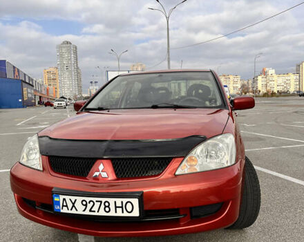 Червоний Міцубісі Lancer, об'ємом двигуна 1.6 л та пробігом 194 тис. км за 5500 $, фото 5 на Automoto.ua
