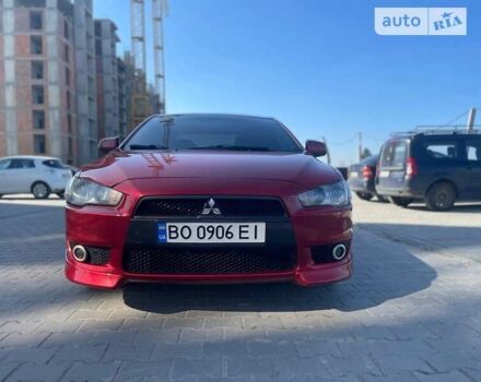 Червоний Міцубісі Lancer, об'ємом двигуна 2 л та пробігом 293 тис. км за 7350 $, фото 2 на Automoto.ua