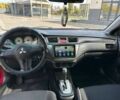 Красный Мицубиси Лансер, объемом двигателя 1.6 л и пробегом 246 тыс. км за 5000 $, фото 6 на Automoto.ua