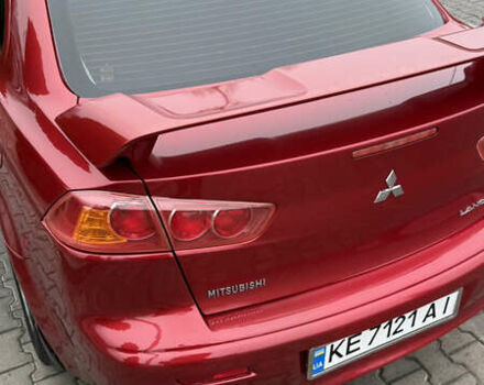 Красный Мицубиси Лансер, объемом двигателя 2 л и пробегом 261 тыс. км за 7200 $, фото 8 на Automoto.ua
