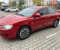 Красный Мицубиси Лансер, объемом двигателя 1.5 л и пробегом 207 тыс. км за 4500 $, фото 1 на Automoto.ua