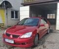 Мицубиси Лансер 2007 в Нежине на Automoto.ua Красный Мицубиси Лансер, объемом двигателя 2 л и пробегом 200 тыс. км за 5500 $, фото 1 на Automoto.ua