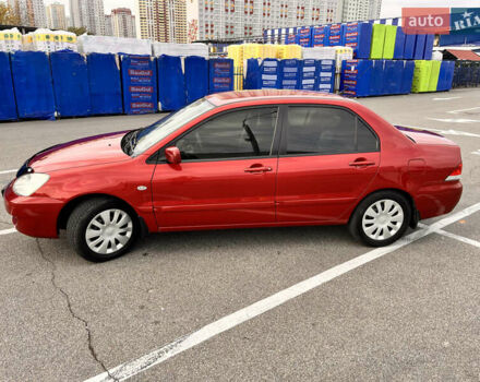 Червоний Міцубісі Lancer, об'ємом двигуна 1.6 л та пробігом 194 тис. км за 5500 $, фото 1 на Automoto.ua