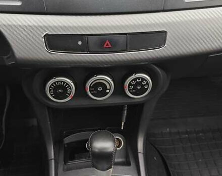 Червоний Міцубісі Lancer, об'ємом двигуна 2 л та пробігом 186 тис. км за 5600 $, фото 12 на Automoto.ua