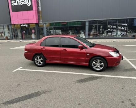 Красный Мицубиси Лансер, объемом двигателя 1.6 л и пробегом 285 тыс. км за 3650 $, фото 5 на Automoto.ua