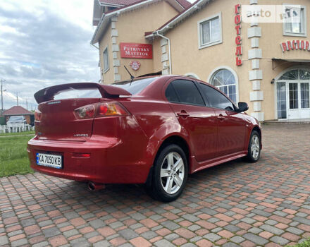 Червоний Міцубісі Lancer, об'ємом двигуна 2 л та пробігом 191 тис. км за 7500 $, фото 25 на Automoto.ua