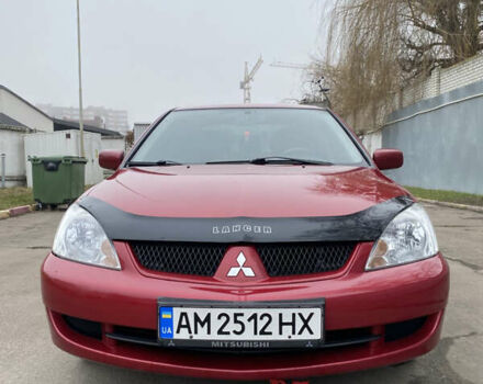 Червоний Міцубісі Lancer, об'ємом двигуна 1.58 л та пробігом 151 тис. км за 5600 $, фото 9 на Automoto.ua