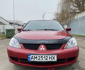 Червоний Міцубісі Lancer, об'ємом двигуна 1.58 л та пробігом 151 тис. км за 5600 $, фото 9 на Automoto.ua