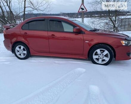 Червоний Міцубісі Lancer, об'ємом двигуна 2 л та пробігом 171 тис. км за 7500 $, фото 7 на Automoto.ua