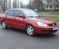 Красный Мицубиси Лансер, объемом двигателя 1.6 л и пробегом 250 тыс. км за 3700 $, фото 2 на Automoto.ua