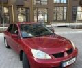 Червоний Міцубісі Lancer, об'ємом двигуна 0.16 л та пробігом 250 тис. км за 3499 $, фото 1 на Automoto.ua