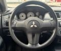 Мицубиси Лансер 2007 в Киеве на Automoto.ua Красный Мицубиси Лансер, объемом двигателя 1.6 л и пробегом 212 тыс. км за 5490 $, фото 13 на Automoto.ua