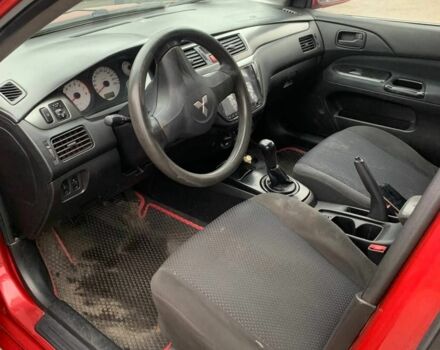 Червоний Міцубісі Lancer, об'ємом двигуна 1.6 л та пробігом 300 тис. км за 2799 $, фото 5 на Automoto.ua