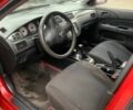 Червоний Міцубісі Lancer, об'ємом двигуна 1.6 л та пробігом 300 тис. км за 2799 $, фото 5 на Automoto.ua
