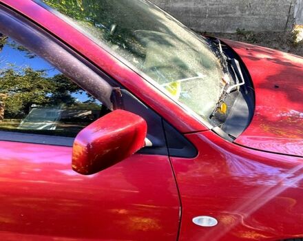 Красный Мицубиси Лансер, объемом двигателя 1.6 л и пробегом 344 тыс. км за 4000 $, фото 7 на Automoto.ua