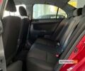 Красный Мицубиси Лансер, объемом двигателя 2 л и пробегом 100 тыс. км за 8400 $, фото 12 на Automoto.ua