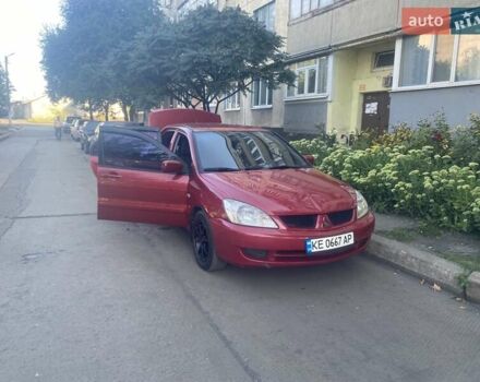 Красный Мицубиси Лансер, объемом двигателя 1.6 л и пробегом 210 тыс. км за 4200 $, фото 5 на Automoto.ua