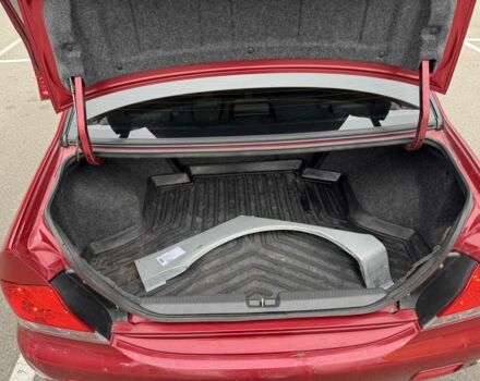 Красный Мицубиси Лансер, объемом двигателя 1.6 л и пробегом 285 тыс. км за 3650 $, фото 14 на Automoto.ua