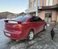 Червоний Міцубісі Lancer, об'ємом двигуна 2 л та пробігом 230 тис. км за 5900 $, фото 1 на Automoto.ua