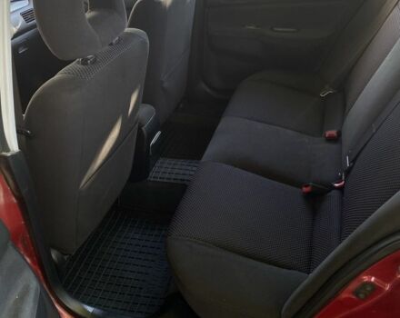 Красный Мицубиси Лансер, объемом двигателя 1.6 л и пробегом 277 тыс. км за 3299 $, фото 4 на Automoto.ua