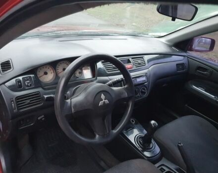 Красный Мицубиси Лансер, объемом двигателя 1.6 л и пробегом 250 тыс. км за 3700 $, фото 7 на Automoto.ua