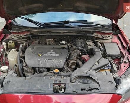 Міцубісі Lancer 2007 у Києві на Automoto.ua Червоний Міцубісі Lancer, об'ємом двигуна 2 л та пробігом 186 тис. км за 5600 $, фото 33 на Automoto.ua